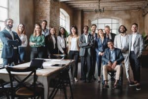 Diverse group of professionals in a modern office setting.