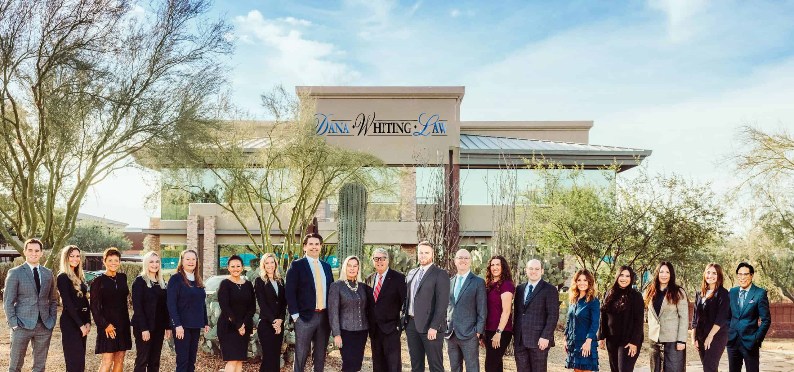 Dana Whiting Law office exterior with team members in Scottsdale, AZ.