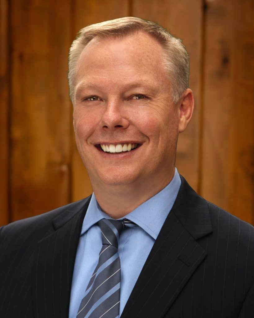 Professional portrait of Donnie Coats, experienced lawyer at Dana Whiting Law.