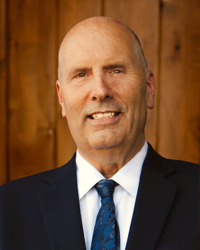 Professional portrait of Kenneth W. Schutt, Jr., experienced lawyer at Dana Whiting Law.