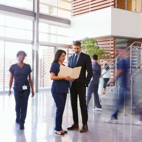Patient consultation with a lawyer in a modern healthcare facility.