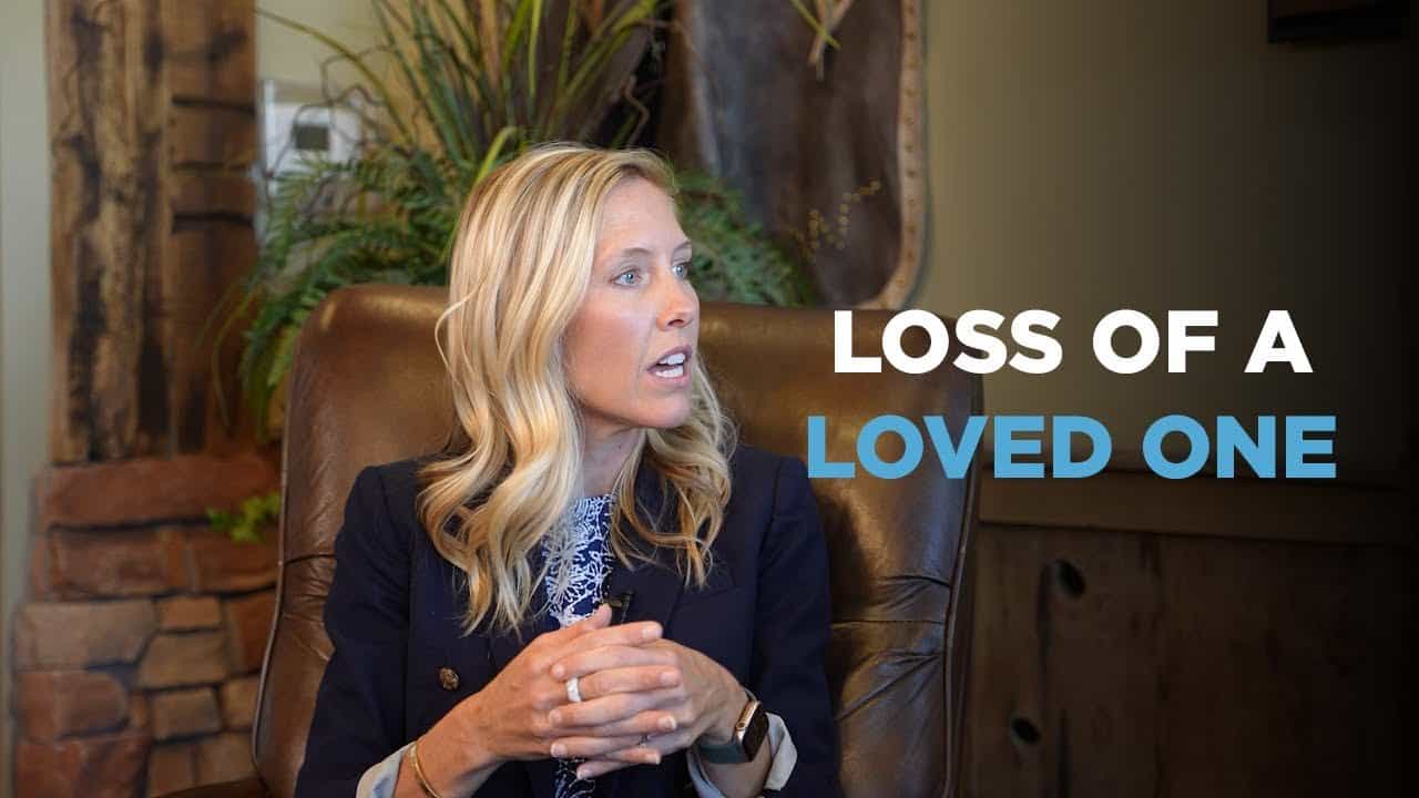 Compassionate woman lawyer discussing legal options for loss of a loved one.